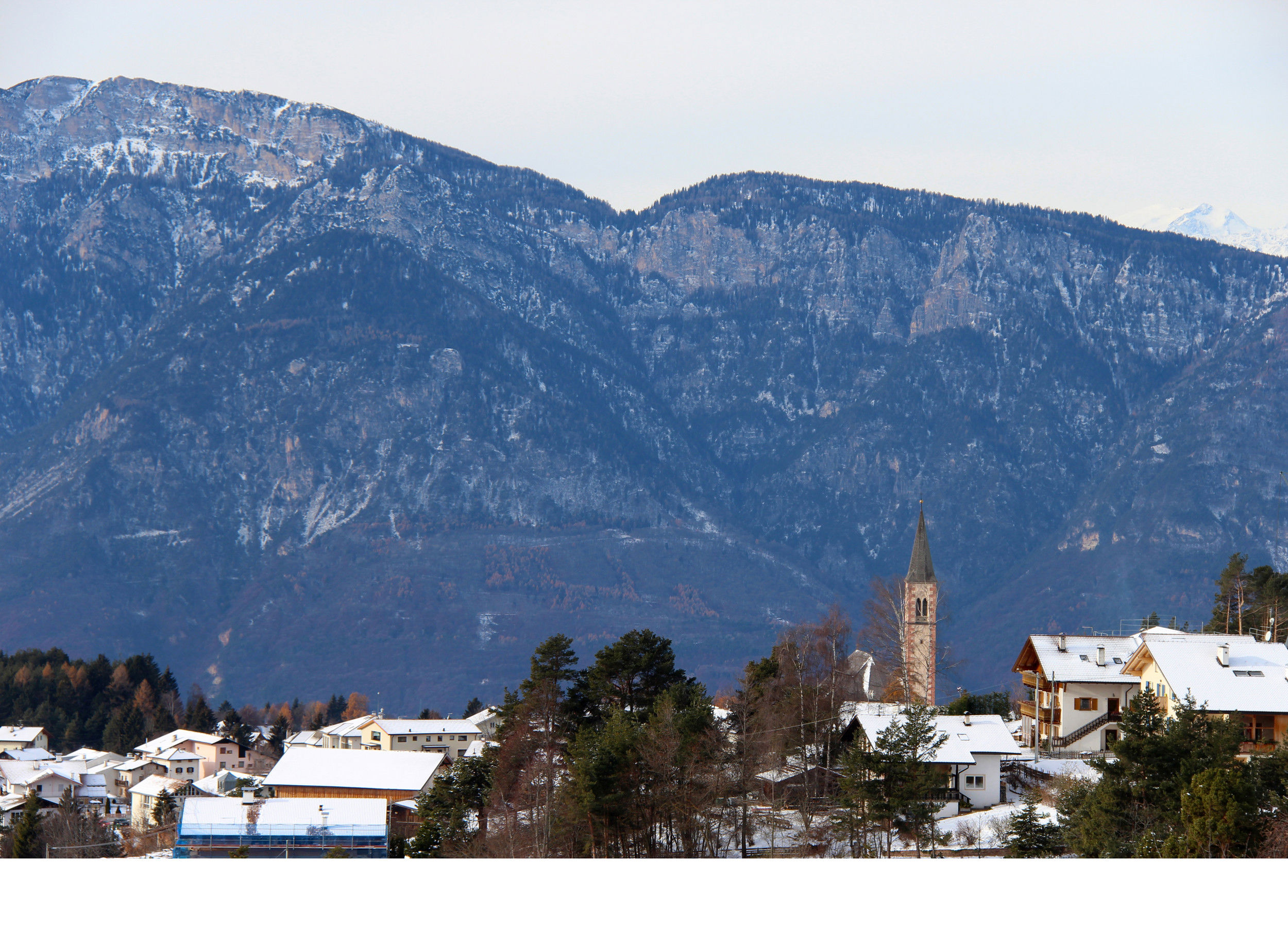 Aldein im Winter und mit Schnee bedeckt